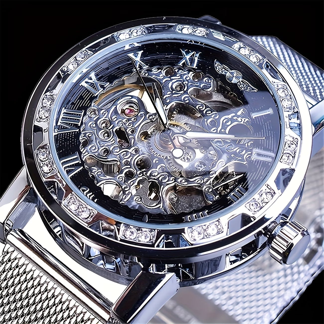 Montre mécanique élégante pour hommes avec strass et en maille ajourée, sans pile, variante en noire, dorée et argentée